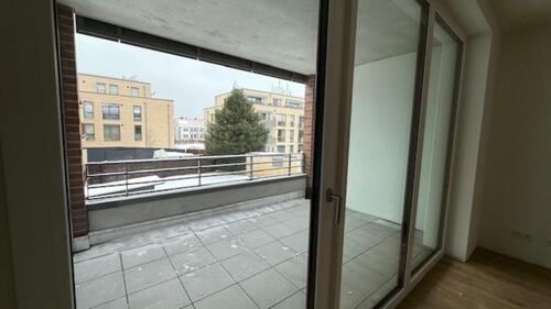 Foto - Neubau: 2-Zimmer-Wohnung, Einbauküche, Fußbodenheizung, Dielenboden, Loggia, Aufzug und Tiefgaragenstellplatz