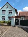 Foto - Einfamilienenhaus mit Nebengebäuden und Garten