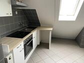 Foto - 2-Zi.-Dachgeschosswohnung mit Stellplatz & Gartenmitbenutzung