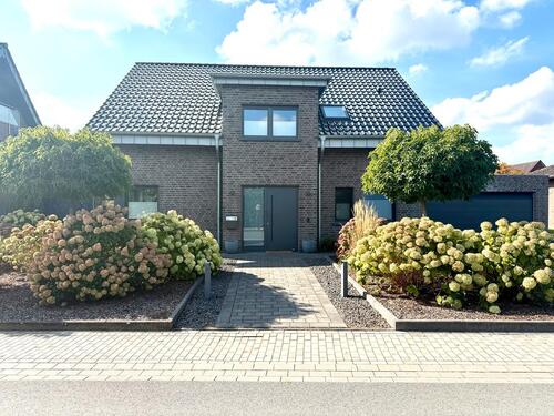 Foto - Freistehendes Einfamilienhaus in Massivbauweise