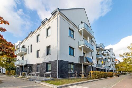 Foto - Wohnen im Grünen: Erdgeschoss-Neubauwohnung in ruhiger Lage