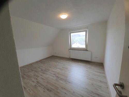 Foto - Wohnen mit Haus-Charakter: 3ZW mit Balkon & Garten