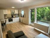 Foto - Renovierte 2-Zimmerwohnung mit Terrasse + Garten + Stellplatz