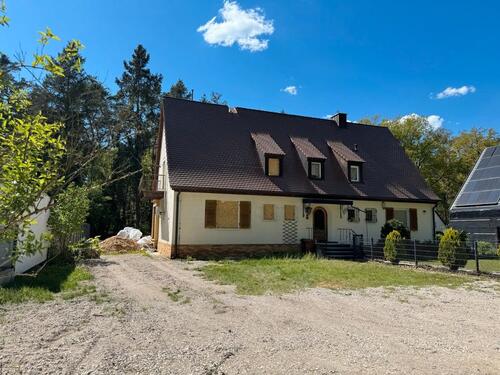 Foto - Grundstück mit renovierungsbedürftiger Doppelhaushälfte (Rohbau)