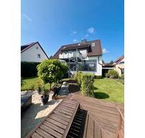 Modernes Einfamilienhaus mit unterbautem Blick in Giesen bei Hild