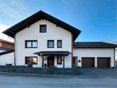 Foto - Freistehendes KfW 55 Einfamilienhaus mit Einliegerwohnung .