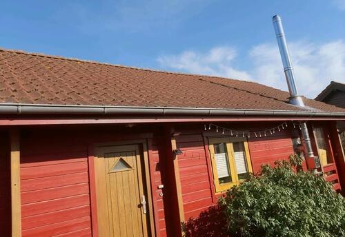 Foto - Holzhaus mit Pultdachanbau und Keller