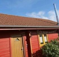 Holzhaus mit Pultdachanbau und Keller - Steinfeld