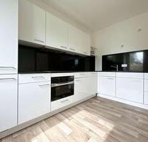 2-Zimmer-Wohnung mit moderner Einbauküche, Südwest-Balkon & Stellplatz - Papendorf