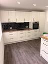 Foto - Erdgeschosswohnung mit Einbauküche und Balkon