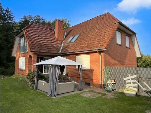 Foto - Erdgeschosswohnung mit Garten und Garage