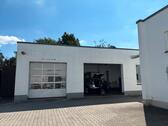 Foto - Aufbereitungshalle neben einem bestehenden Autohaus mit Werkstatt in Zeulenroda-Triebes