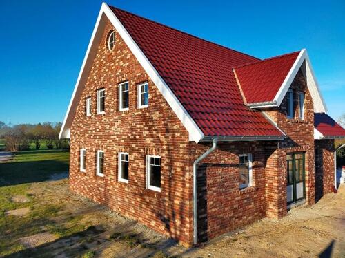 Foto - Erstbezug: Neubau ebenerdig mit Garage und Garten bei Hooksiel
