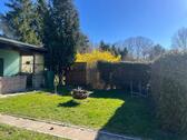 Foto - Garten mit massivem Gartenhaus in Schwaan
