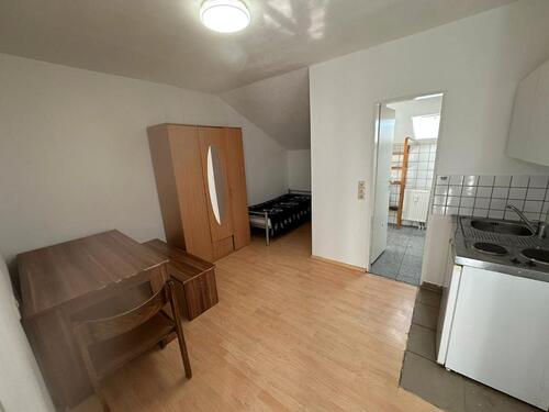 Foto - Möbliertes 1-Zi.-Apartment mit Einbauküche und Bad zur Miete