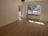 Foto - Milbertshofen: Ruhig gelegene 3-Zi.-Whg. mit überdachtem Südbalkon u. TG.-Stellplatz.