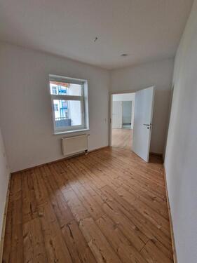 Foto - Zentrale Lage: Zweiraumwohnung mit Gartenblick, Balkon und EBK