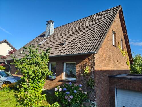 Foto - Freistehendes Einfamilienhaus mit Garage zum Verkauf