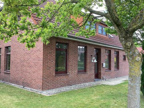 Foto - Einfamilienhaus mit Einliegerwohnung und Garagen
