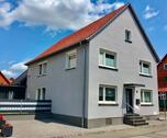 Foto - Freist. Einfamilienhaus mit Garten, Doppelgarage und Carport