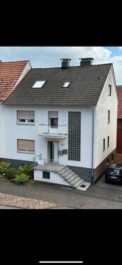 Foto - Ein-Zweifamilienhaus mit Nebengebäuden und Baugrundstück