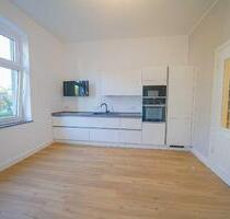 Ratingen-Mitte: Stilvolle 2-Zimmer-Altbauwohnung mit Gartenmitbenutzung