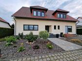 Foto - Mehrfamilienhaus mit Einliegerwohnung