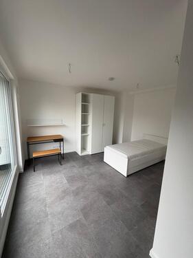 Foto - 1-Zimmer Wohnung möbliert mit EBK und Terrasse 36qm*Erstbezug*