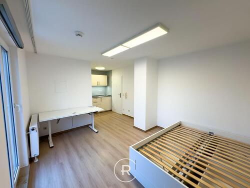 Foto - Möblierte 1-Zimmer-Wohnung mit Garten in Zentrumsnähe