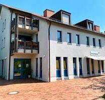 Schöne 2-Zimmer Wohnung mit Einbauküche, Balkon und Tiefgaragenstellplatz am Kurpark in Bad Rodach