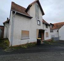 Ein- bis Zweifamilienhaus mit Garagen inkl. Baugrundstück - Liebenau