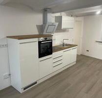 Moderne 1-Zimmer Wohnung mit neuer Einbauküche in Nieder-Ofleiden - Homberg (Ohm)