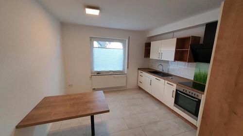 Foto - Doppehaushälfte mit Garage und Garten