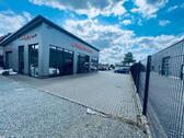 Foto - Autohaus mit 1.800 mª Showroom, Werkstatt & Fahrzeugstellplätzen