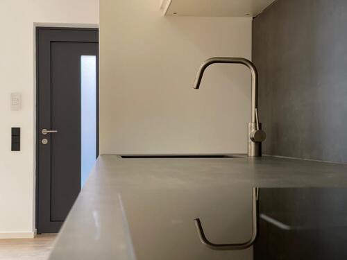 Foto - Hochmoderne Einliegerwohnung in Architektenhaus mit E-Parkplatz