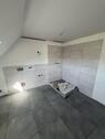 Foto - Großzügige Maisonette-Wohnung (1. OG + DG) mit Garten – Erstbezug