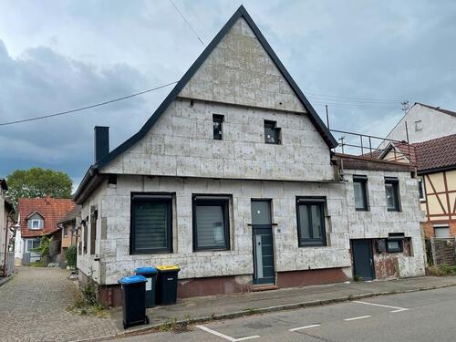 Foto - Einfamilienhaus mit Garten und Terrasse