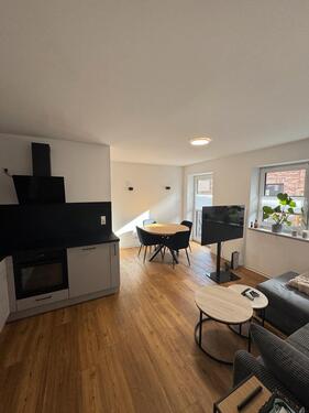 Foto - 2 Zimmer Erdgeschosswohnung mit Terrasse und Carport