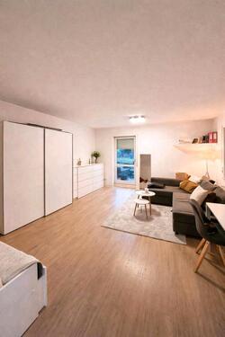 Foto - Eigentumswohnung EG mit TerrasseTiefgaragenstellplatzSpeicher