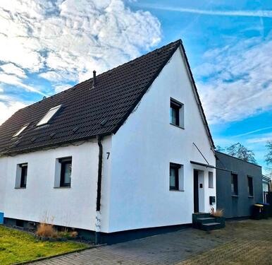 Foto - Doppelhaushälfte mit Wintergarten, Garten & Terasse