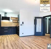 Erstbezug nach Sanierung, zentrale 2 Zimmer-Wohnung mit Loggia und Tiefgaragen-Stellplatz - Würzburg Sanderau