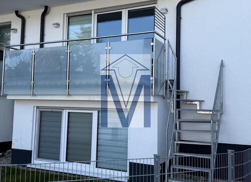 Foto - Neuwertige 3-ZKB-Maisonette mit großem Balkon, Gartenanteil und Garage im EG Souterrain