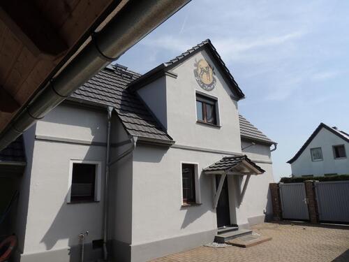 Foto - Einfamilienhaus mit Garage, Nebengebäude u. Garten in Hoyerswerda