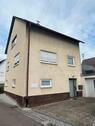 Foto - Einfamilienhaus mit großer Werkstatt, Terrasse & Ausbaupotential
