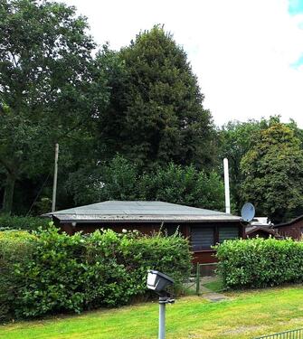 Foto - Kleines winterfestes Holzhäuschen