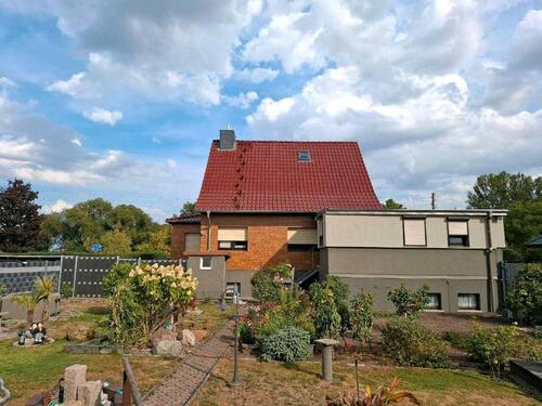 Foto - Einfamilienhaus mit Einliegerwohnung