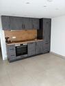 Foto - Zwei Zimmer Wohnung mit Gartenanteil