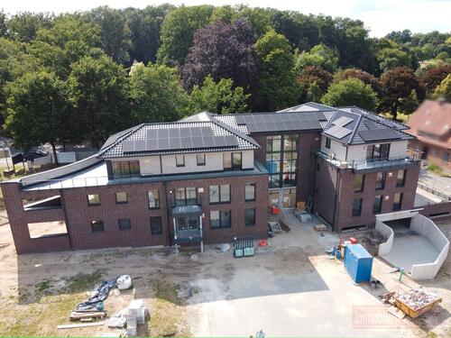 Foto - IMMOBILIEN GUMNIOR präsentert: Neubau mit Nachhaltigkeitszertifizierung! Moderne Erdgeschosswohnung im 'Emsbürener Bogen'