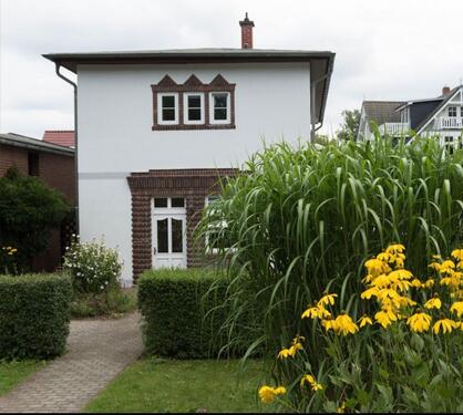 Foto - Attraktives Einfamilienhaus mit fünf Zimmern und Einbauküche