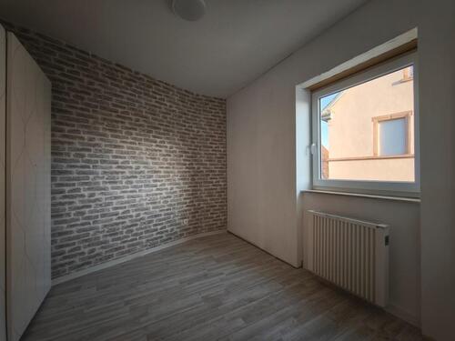 Foto - Etagenwohnung in Bischofsheim zur Miete